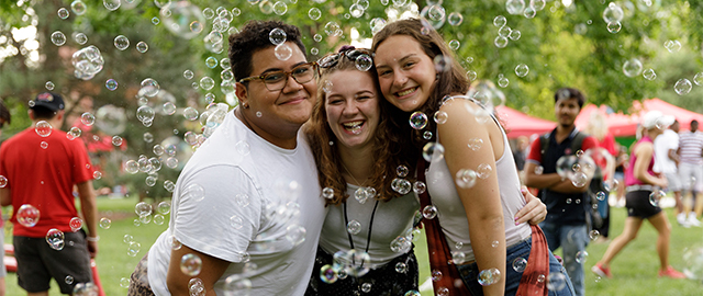 Students enjoying bubbles and fun on the Quad during Welcome Week